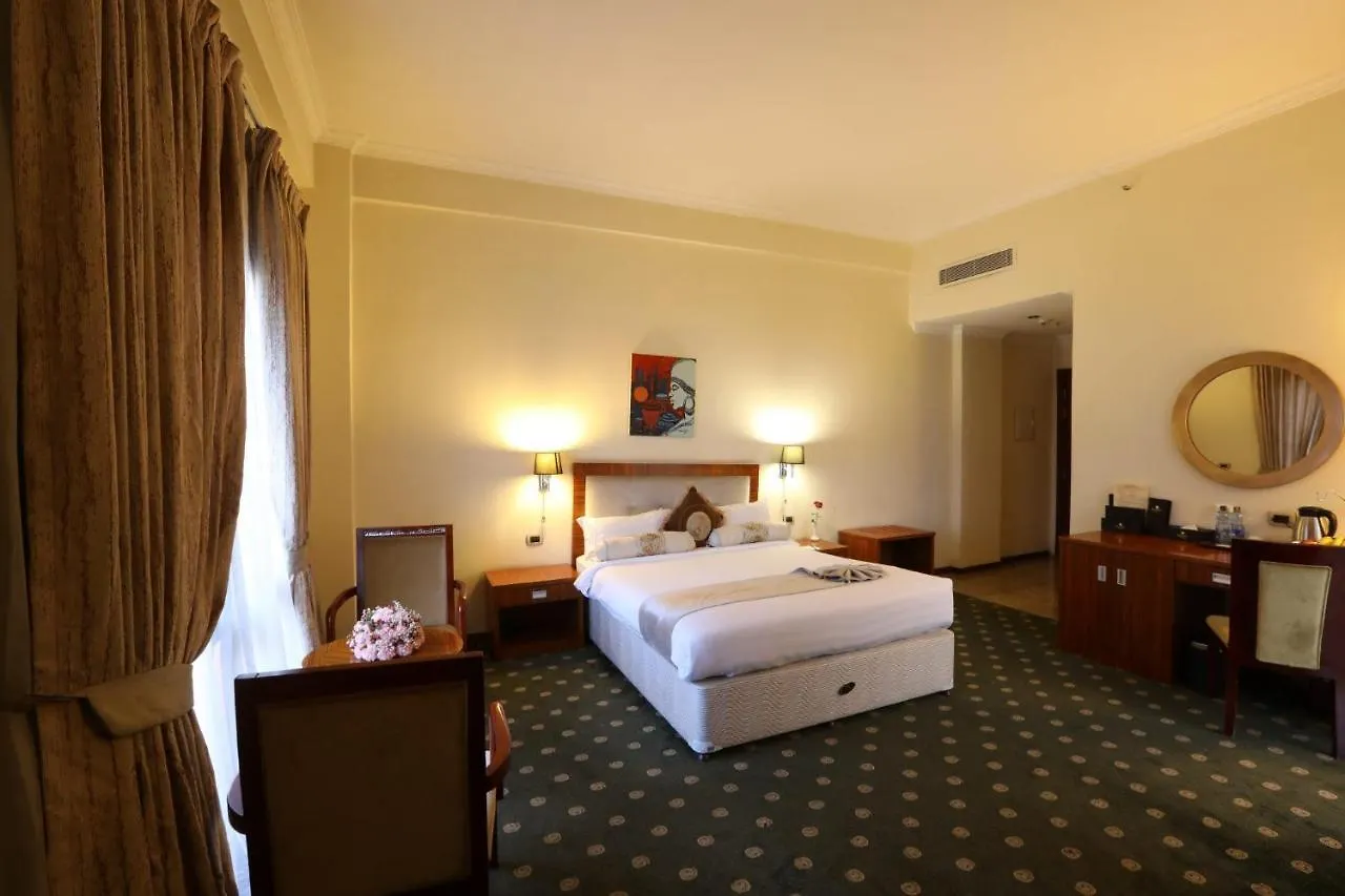 Kenenisa Plus International Hotel contacts
